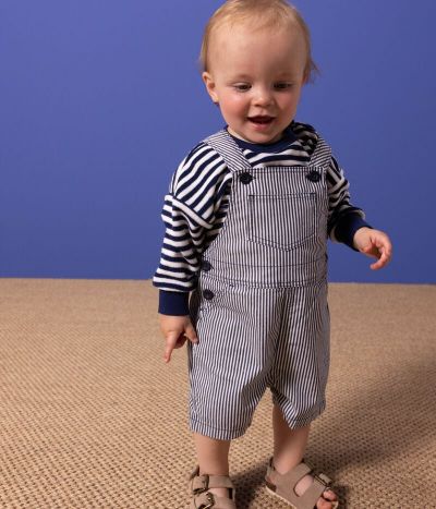Salopette courte bébé en toile rayée