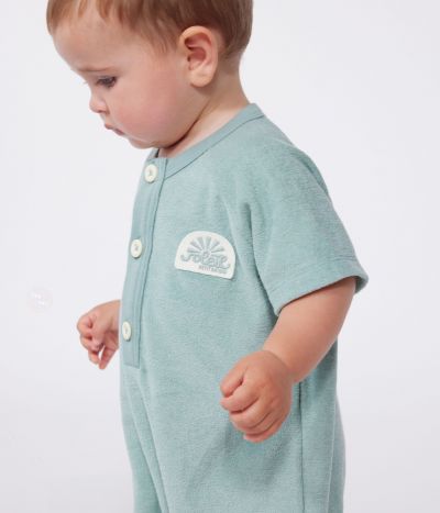 Combicourte bébé en coton éponge manches courtes unie et badge