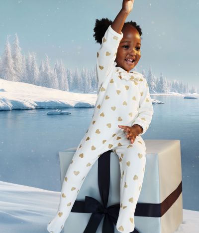 Pyjama bébé en velours ouverture au dos imprimé cœurs dorés