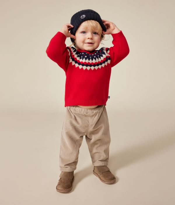 Pull en tricot contenant de la laine bébé